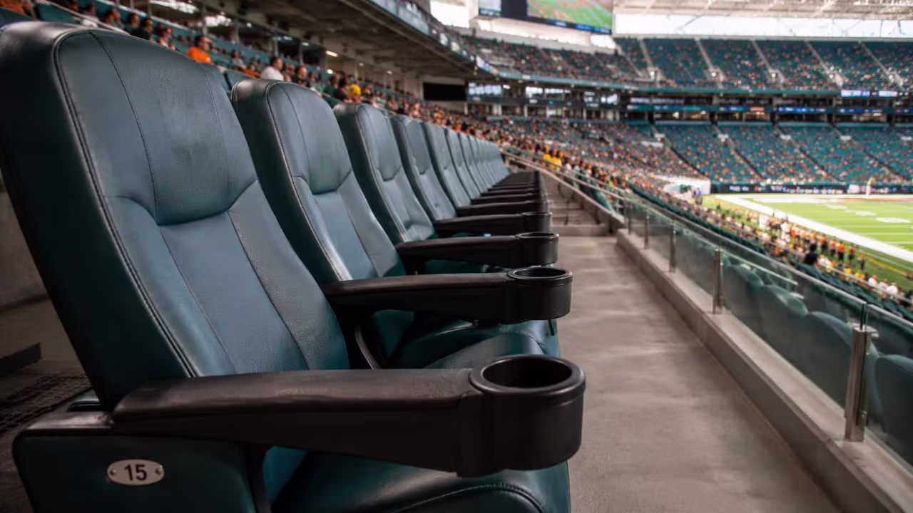 Comfortable premium club seats overlooking the field at Hard Rock Stadium before a Miami Hurricanes game